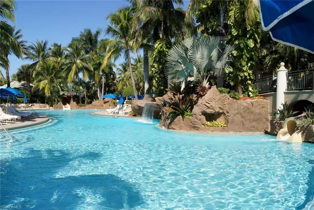 a view of a park with swings and slides