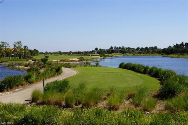 a view of a lake with houses with outdoor space
