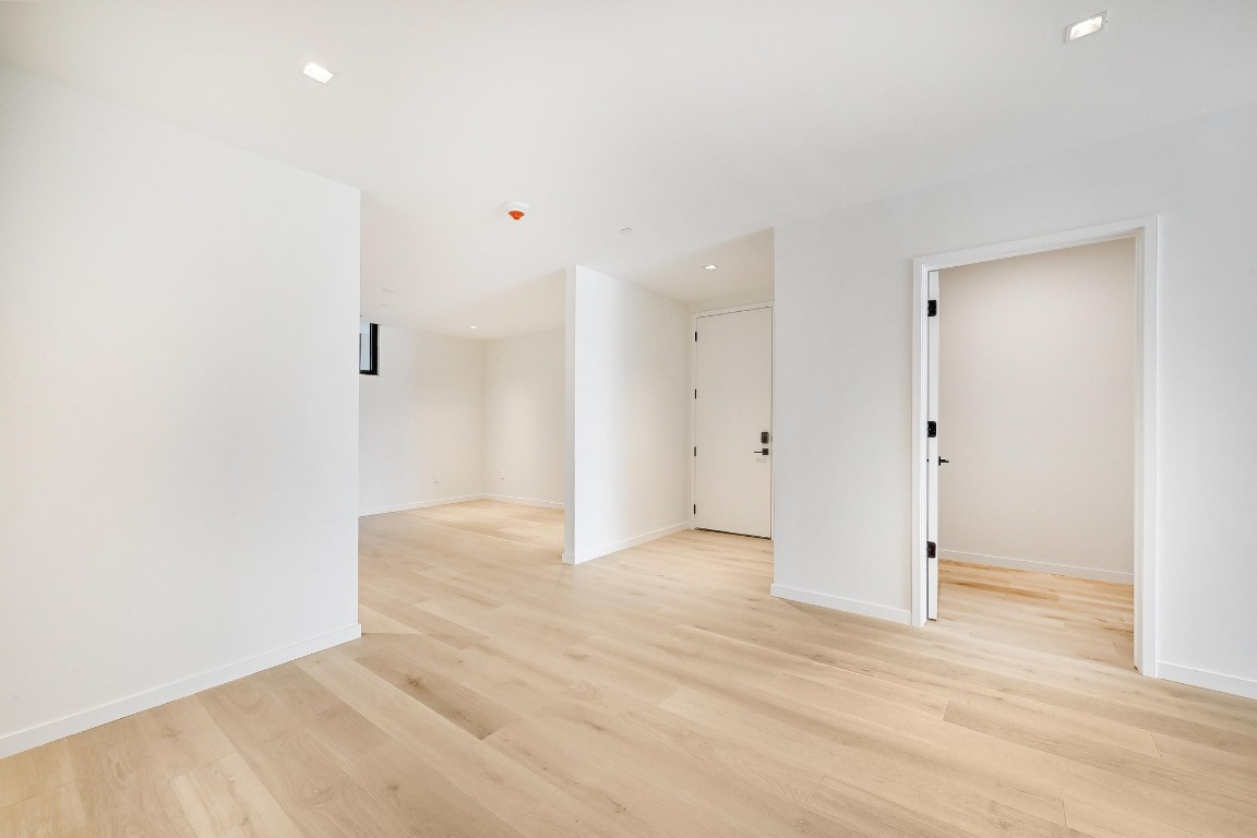 1006 Baylor Street, Unit 202 Austin, TX 78703 - Photo 17 of 23 a view of an empty room