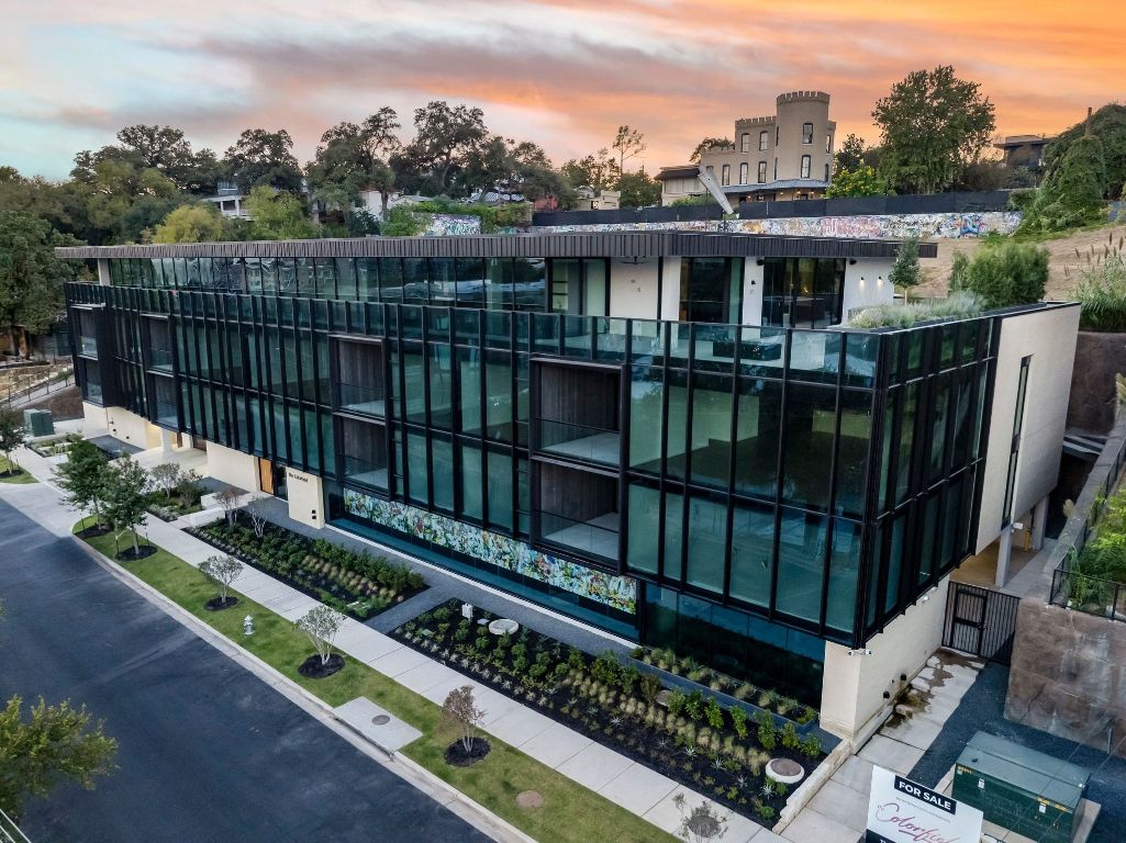 1006 Baylor Street, Unit 202 Austin, TX 78703 - Photo 21 of 23 a view of a house with wooden deck