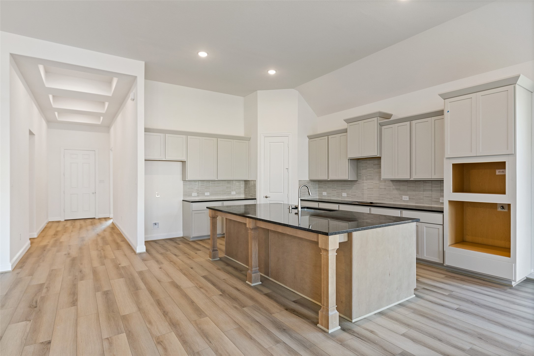 523 Blue River Trail Rosenberg, TX 77471 - Photo 19 of 34 a kitchen with stainless steel appliances granite countertop a stove and a refrigerator