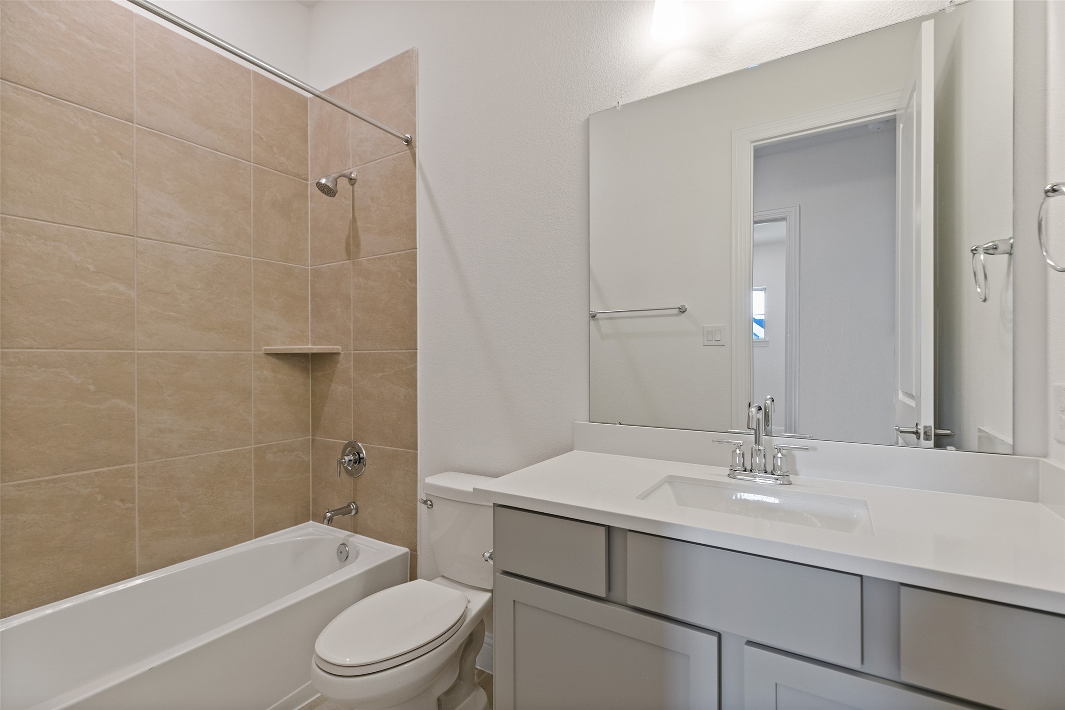 523 Blue River Trail Rosenberg, TX 77471 - Photo 10 of 34 a bathroom with a sink a toilet and shower