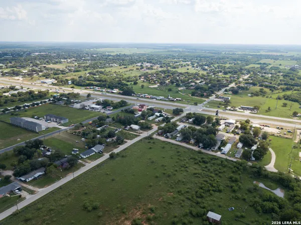 an aerial view of city and lake view