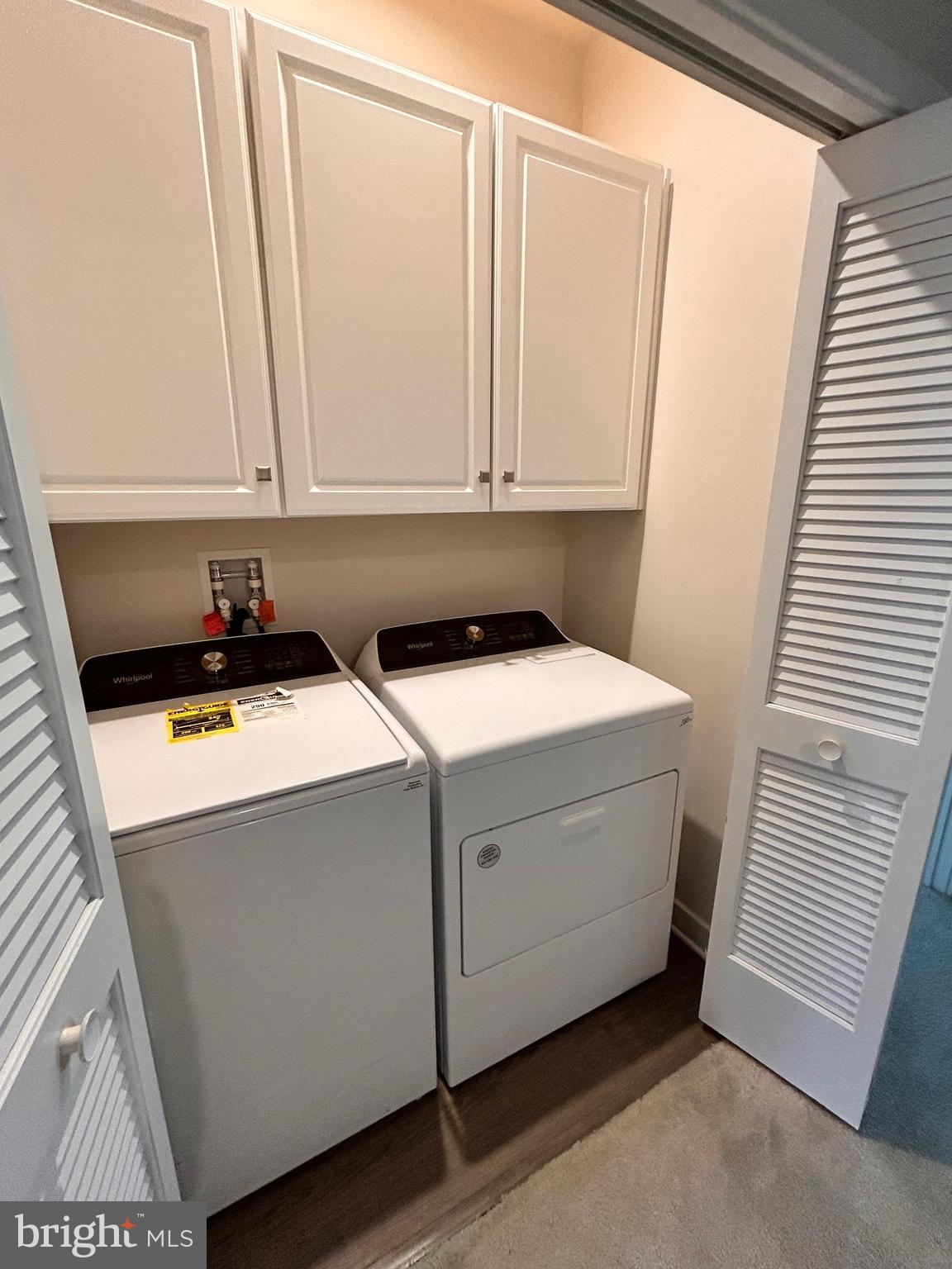 16225 Picasso Place Bowie, MD 20716 - Photo 17 of 19 a utility room with dryer and washer