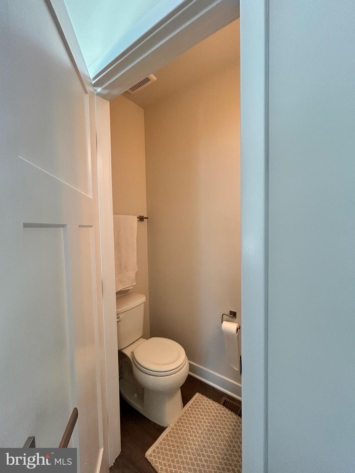 16225 Picasso Place Bowie, MD 20716 - Photo 8 of 19 a white toilet sitting next to a shower