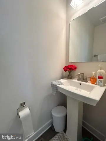 a bathroom with a sink and a toilet