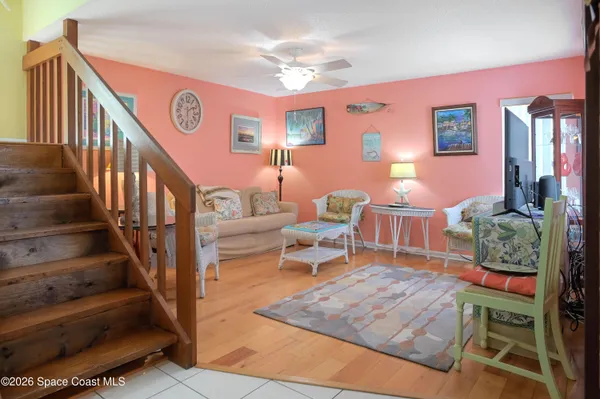 a living room with furniture and a table