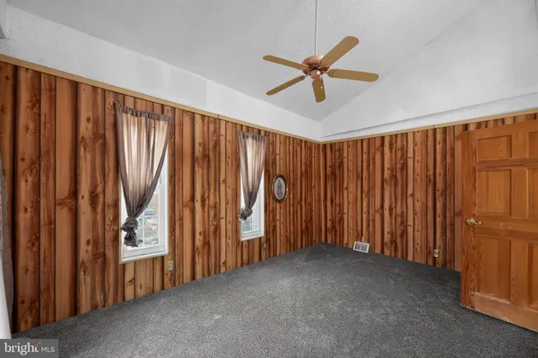 a view of a room with a window and storage