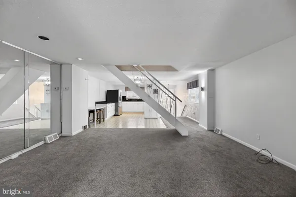a view of a hallway with staircase