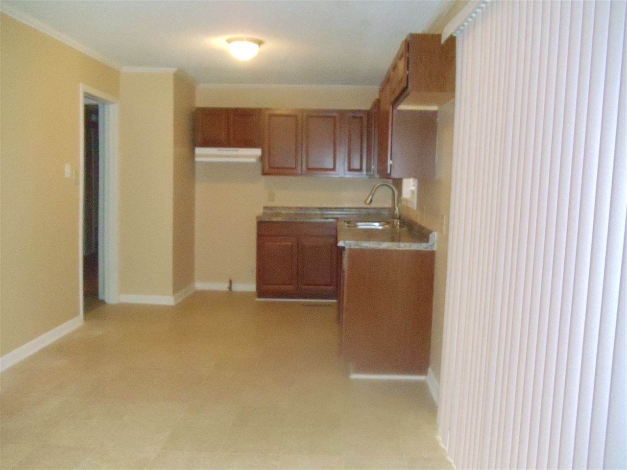 273 North Main Street Ripley, TN 38063 - Photo 5 of 15 a room with a washer and dryer