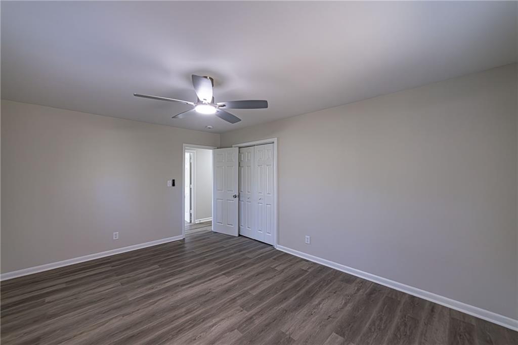 2362 Springrun Court Decatur, GA 30032 - Photo 44 of 83 a view of an empty room with wooden floor
