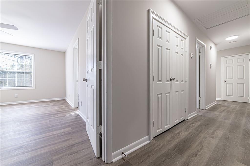 2362 Springrun Court Decatur, GA 30032 - Photo 46 of 83 a view of a hallway with wooden floor and windows