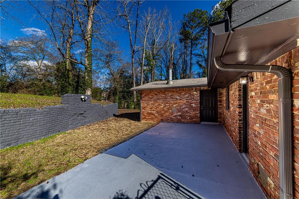 2362 Springrun Court Decatur, GA 30032 - Photo 7 of 83 a view of a pathway of a house with a yard