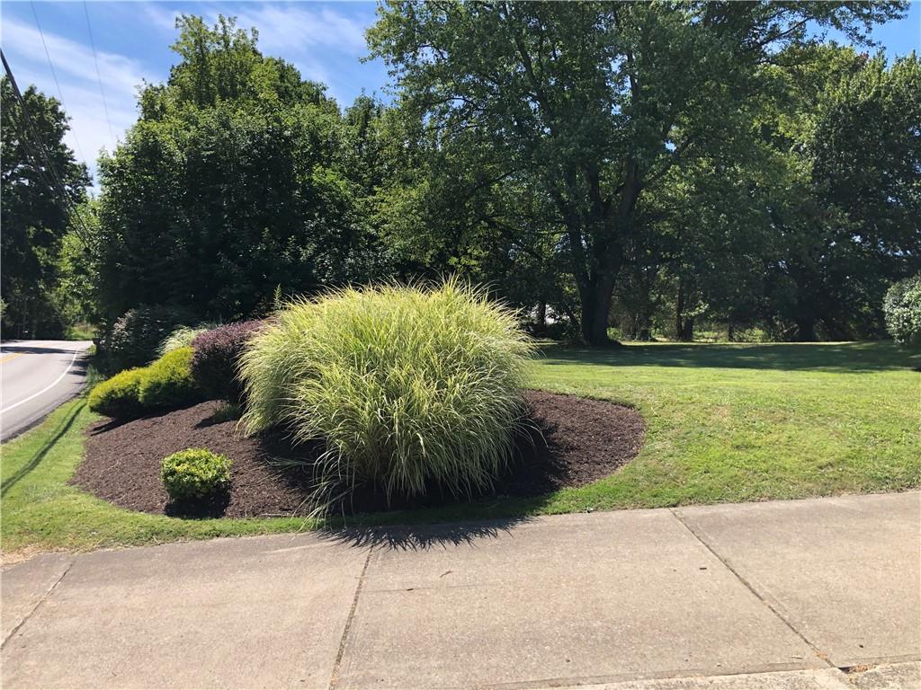 1277 Harrison City Export Road Jeannette, PA 15644 - Photo 16 of 17 a view of a garden with plants