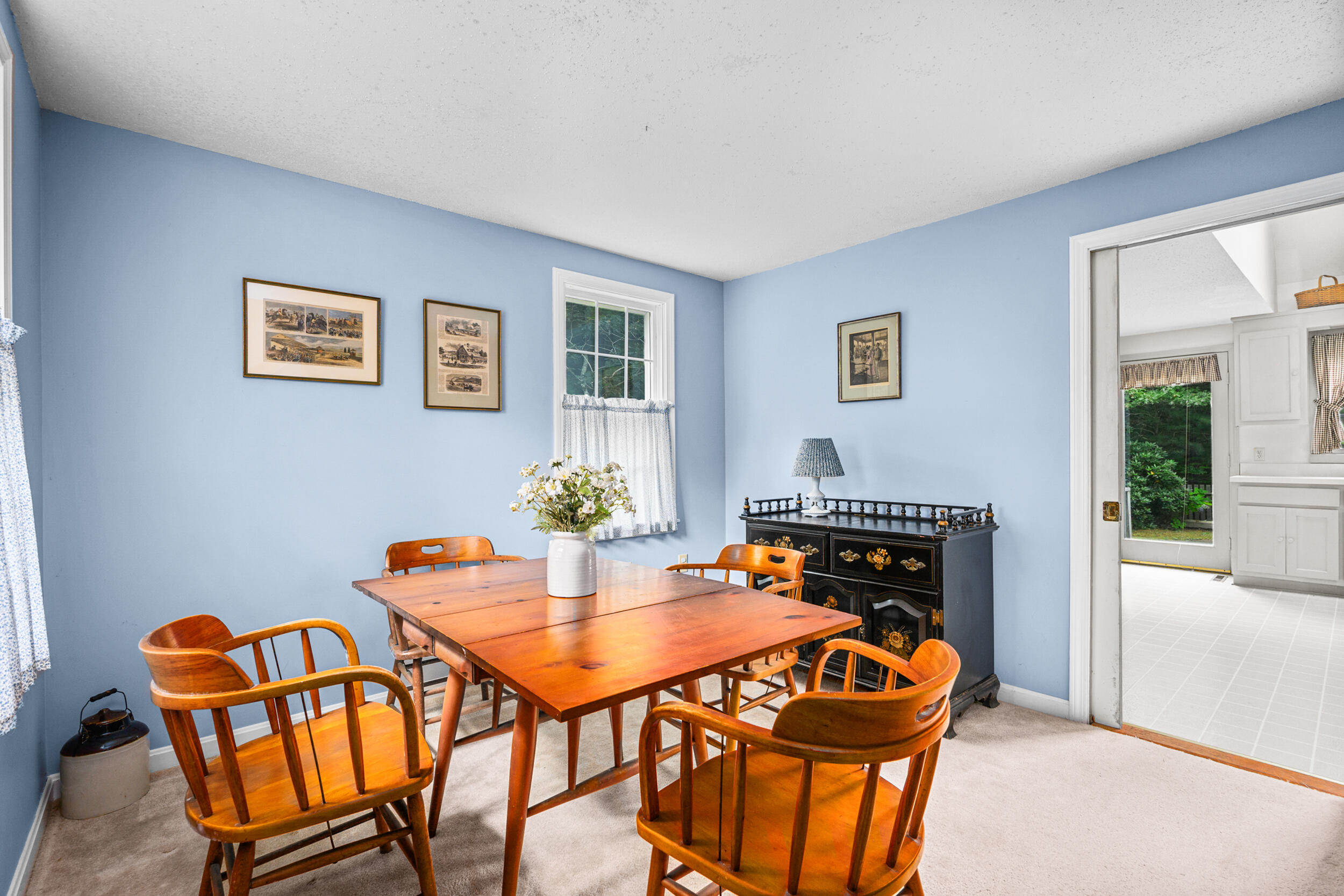 75 Old Toll Road West Barnstable, MA 02668 - Photo 12 of 28 a view of a dining room with furniture and wooden floor