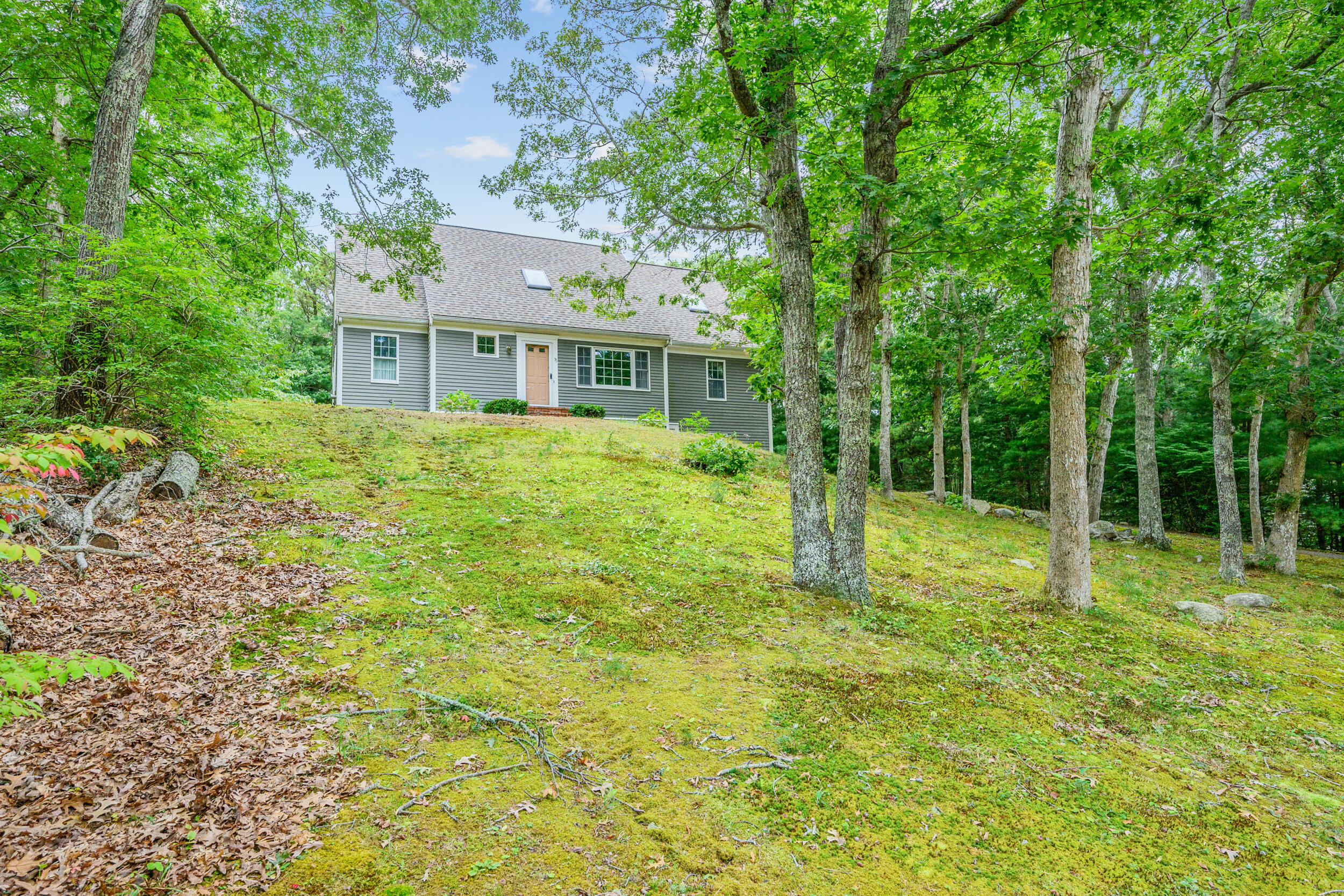 75 Old Toll Road West Barnstable, MA 02668 - Photo 28 of 28 a view of a house with backyard and trees