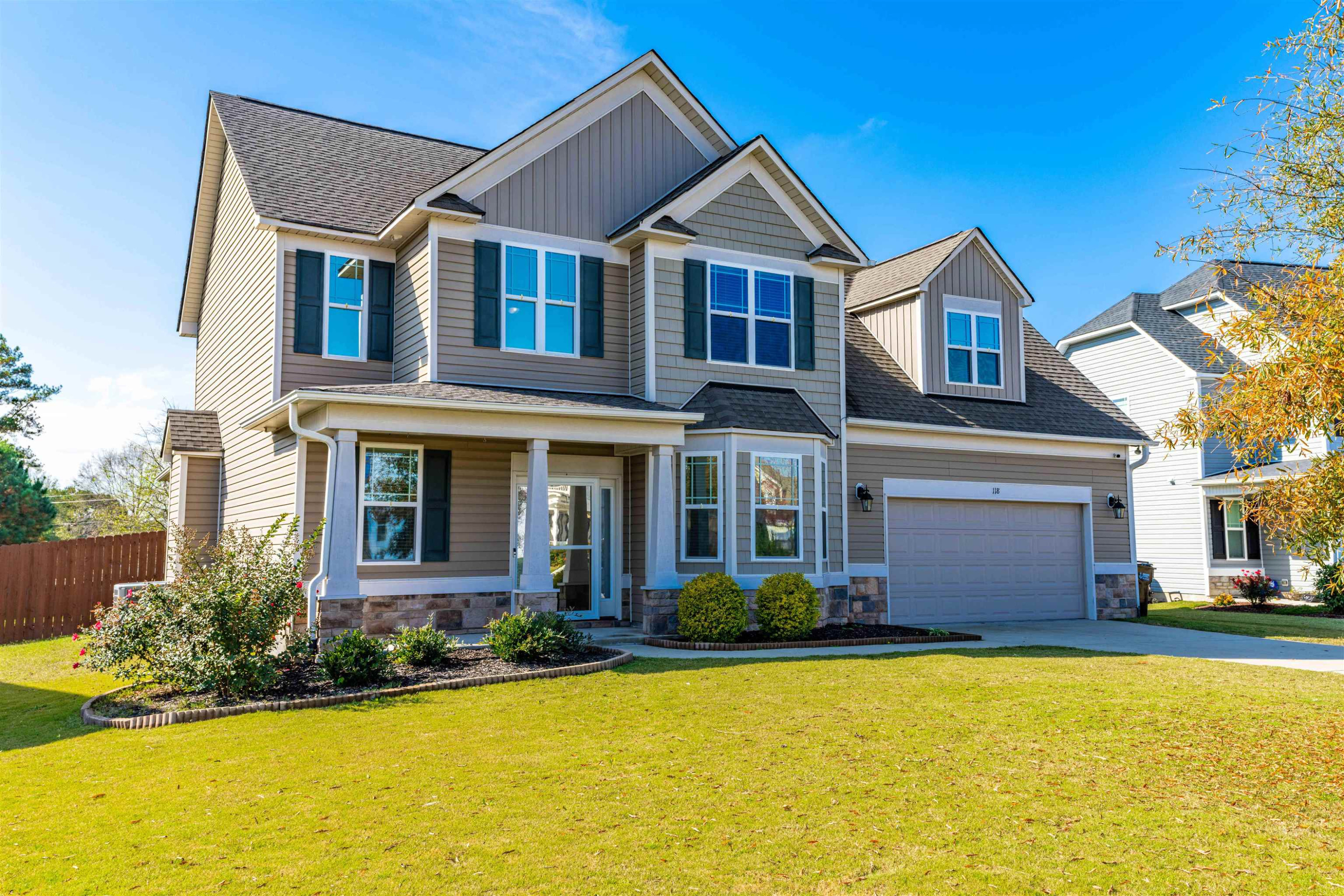 118 Colson Drive Garner, NC 27529 - Photo 1 of 47 a front view of a house with a yard