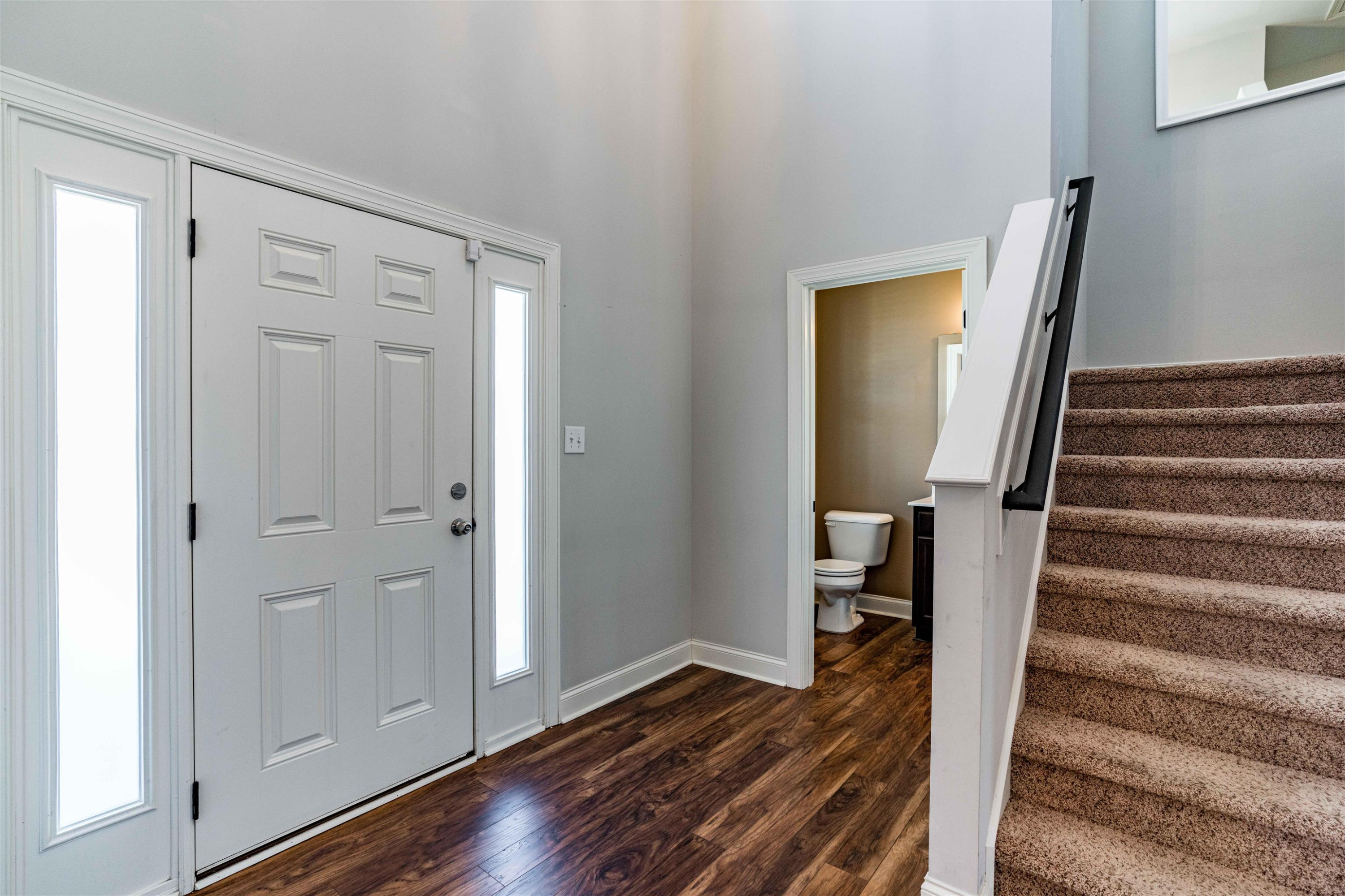 118 Colson Drive Garner, NC 27529 - Photo 22 of 47 a view of entryway with wooden floor