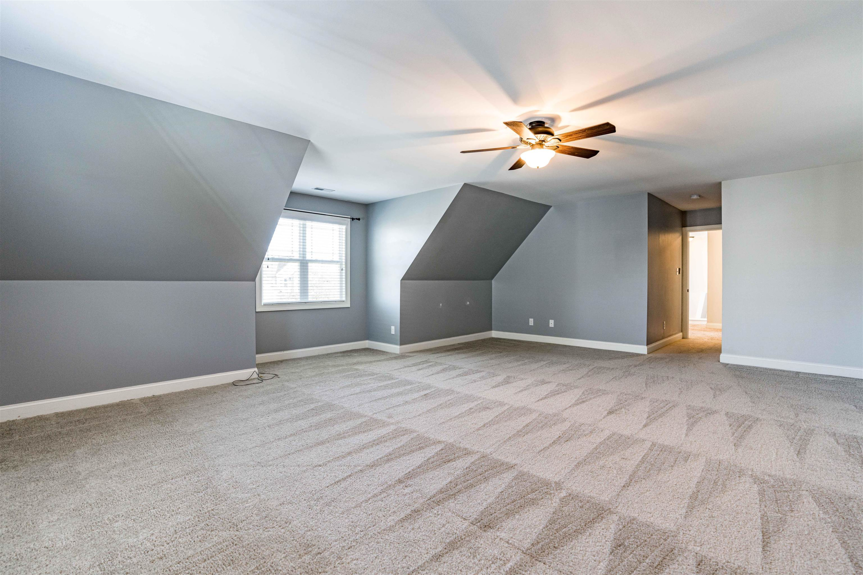 118 Colson Drive Garner, NC 27529 - Photo 33 of 47 wooden floor in an empty room with a window
