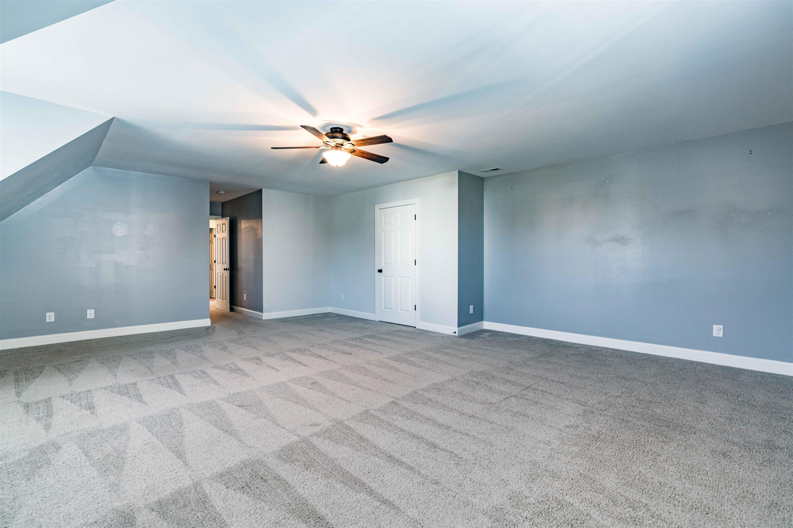 118 Colson Drive Garner, NC 27529 - Photo 34 of 47 a view of an empty room with chandelier fan