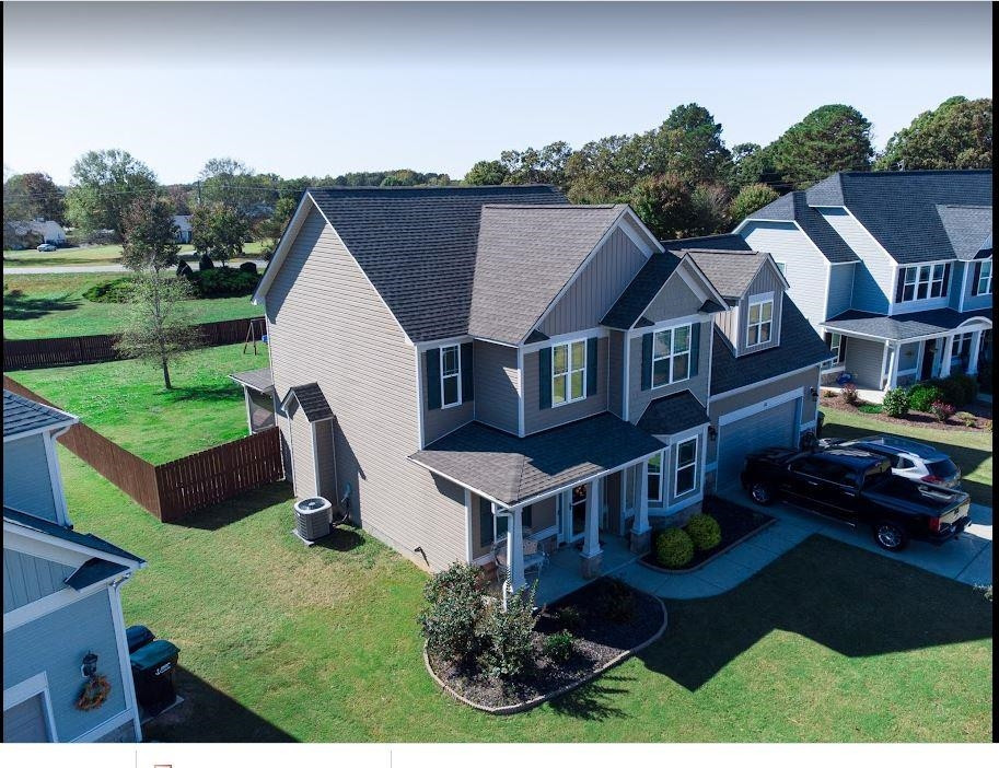 118 Colson Drive Garner, NC 27529 - Photo 5 of 47 a aerial view of a house with garden