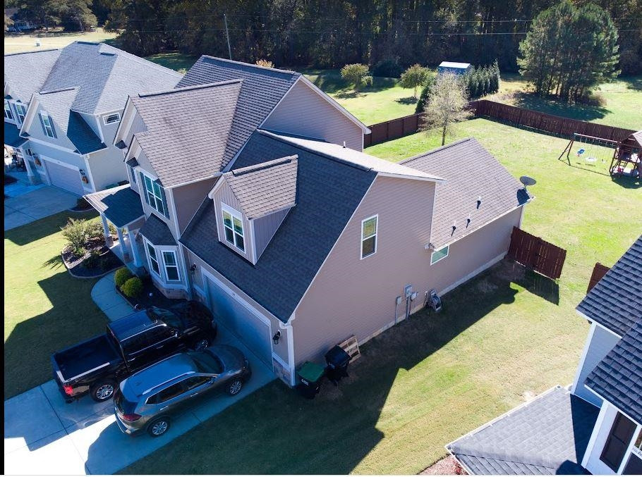 118 Colson Drive Garner, NC 27529 - Photo 6 of 47 an aerial view of a house with swimming pool and porch