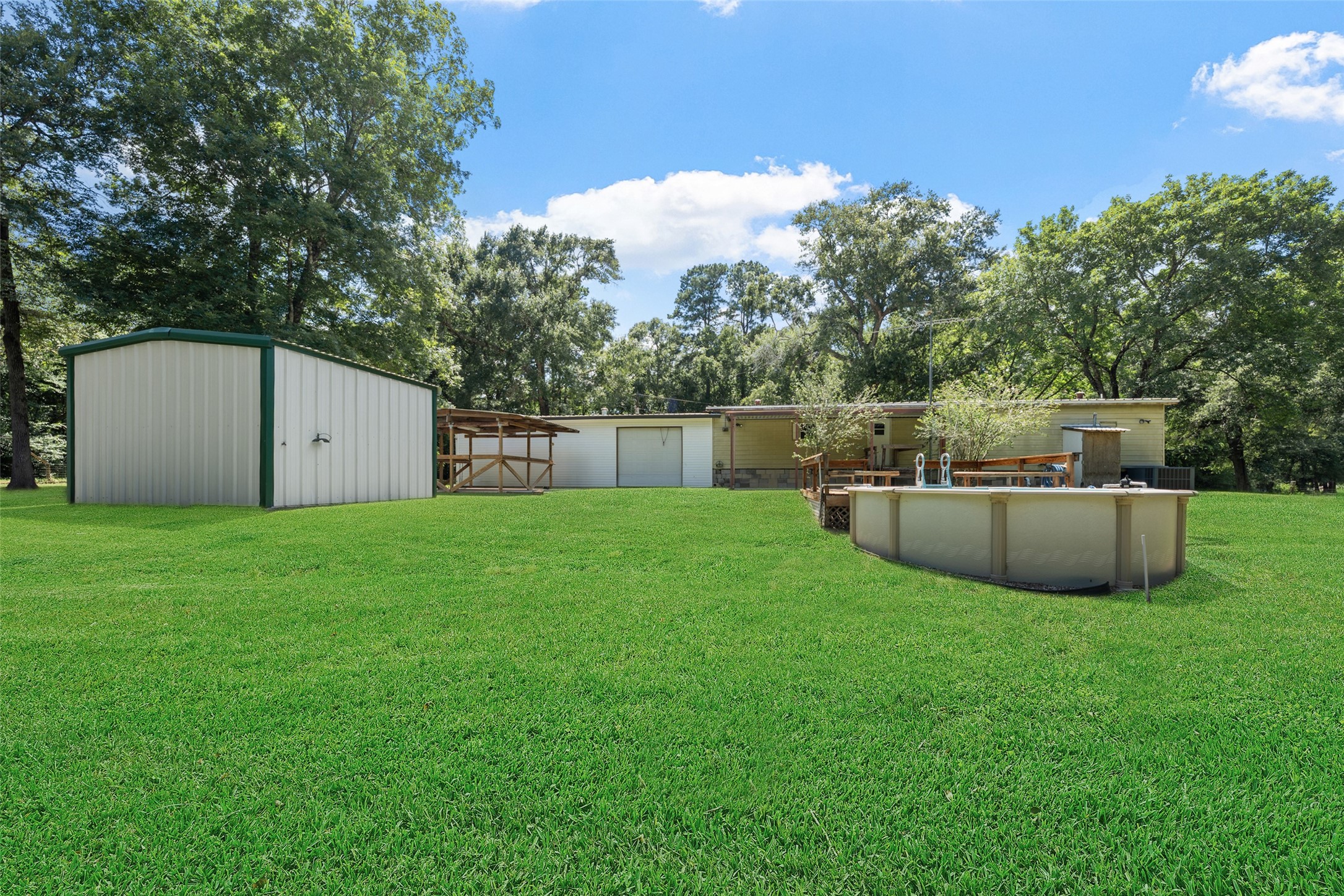 10291 Hart Road Conroe, TX 77306 - Photo 5 of 23 Location of the well house and pool in the backyard.