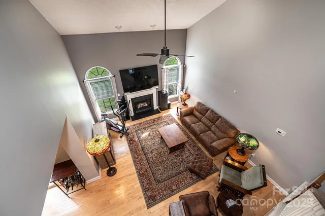 a bedroom with bed and a tv