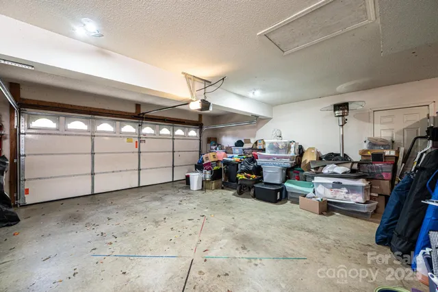 a view of a garage with storage