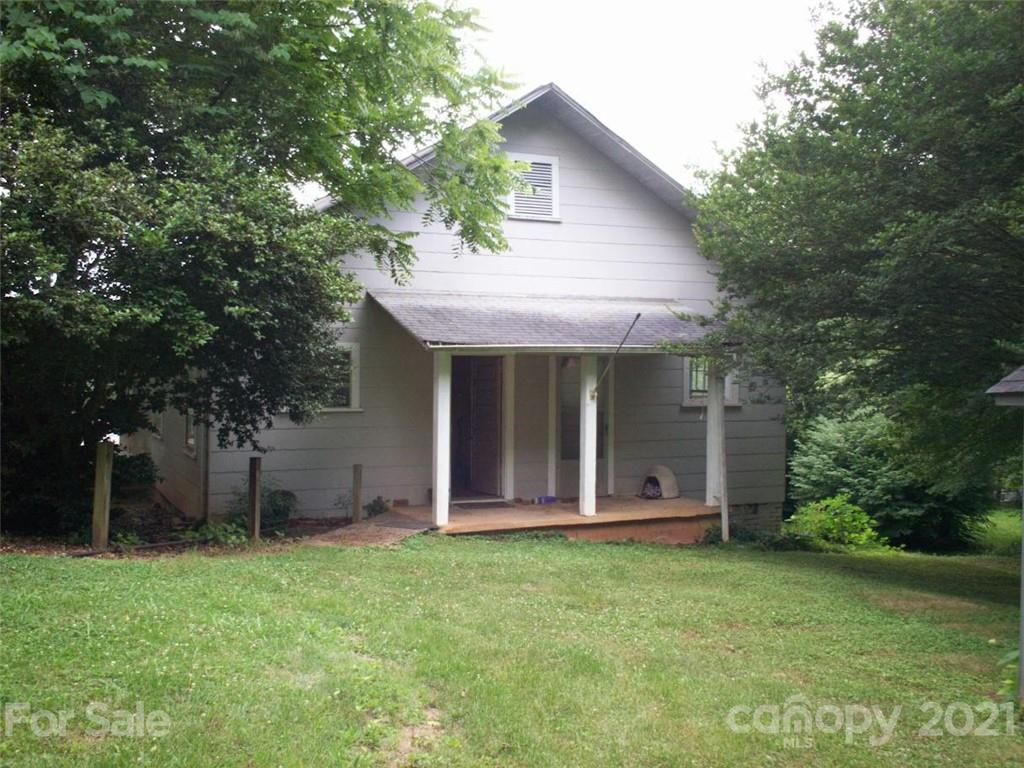 412 South Main Street Southwest Lenoir, NC 28645 - Photo 5 of 10 front view of a house with a yard