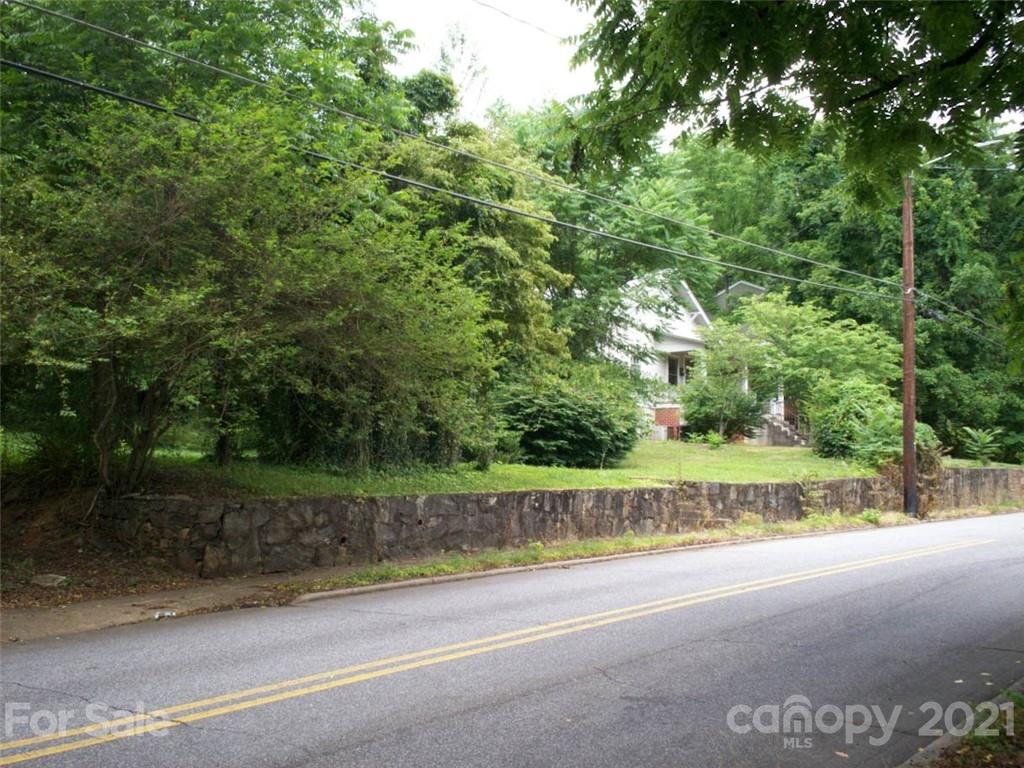 412 South Main Street Southwest Lenoir, NC 28645 - Photo 10 of 10 a view of a yard with a trees
