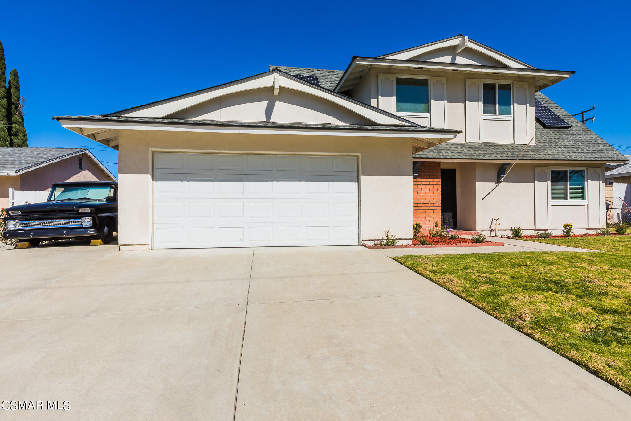 2149 Rhoda Street Simi Valley, CA 93065 - Photo 1 of 48 a front view of a house with a yard