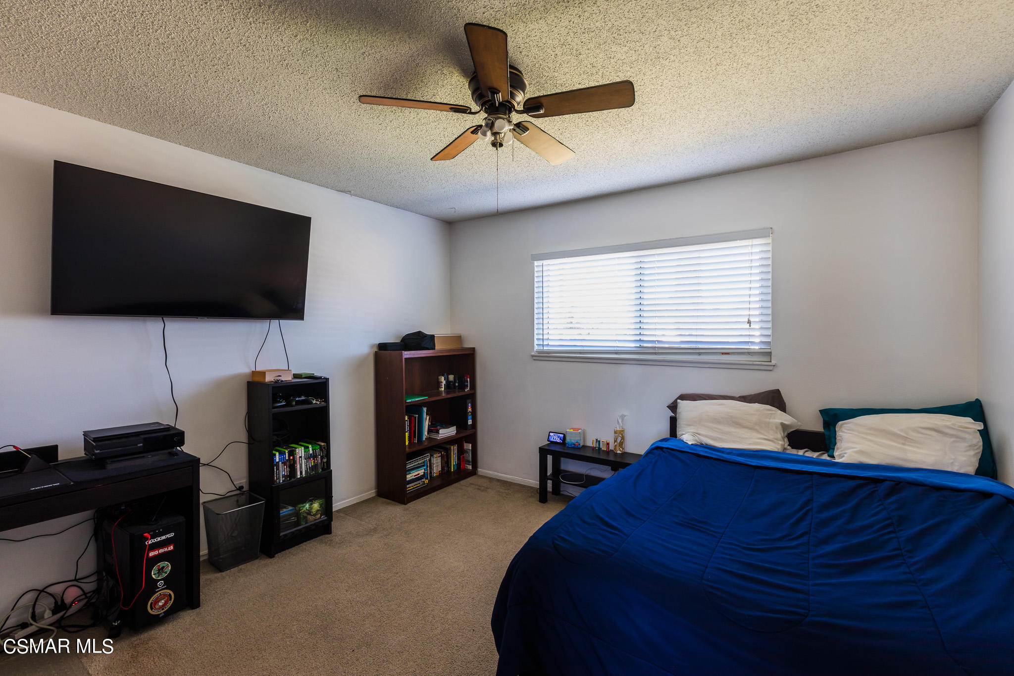 2149 Rhoda Street Simi Valley, CA 93065 - Photo 22 of 48 a bedroom with a bed and a flat screen tv