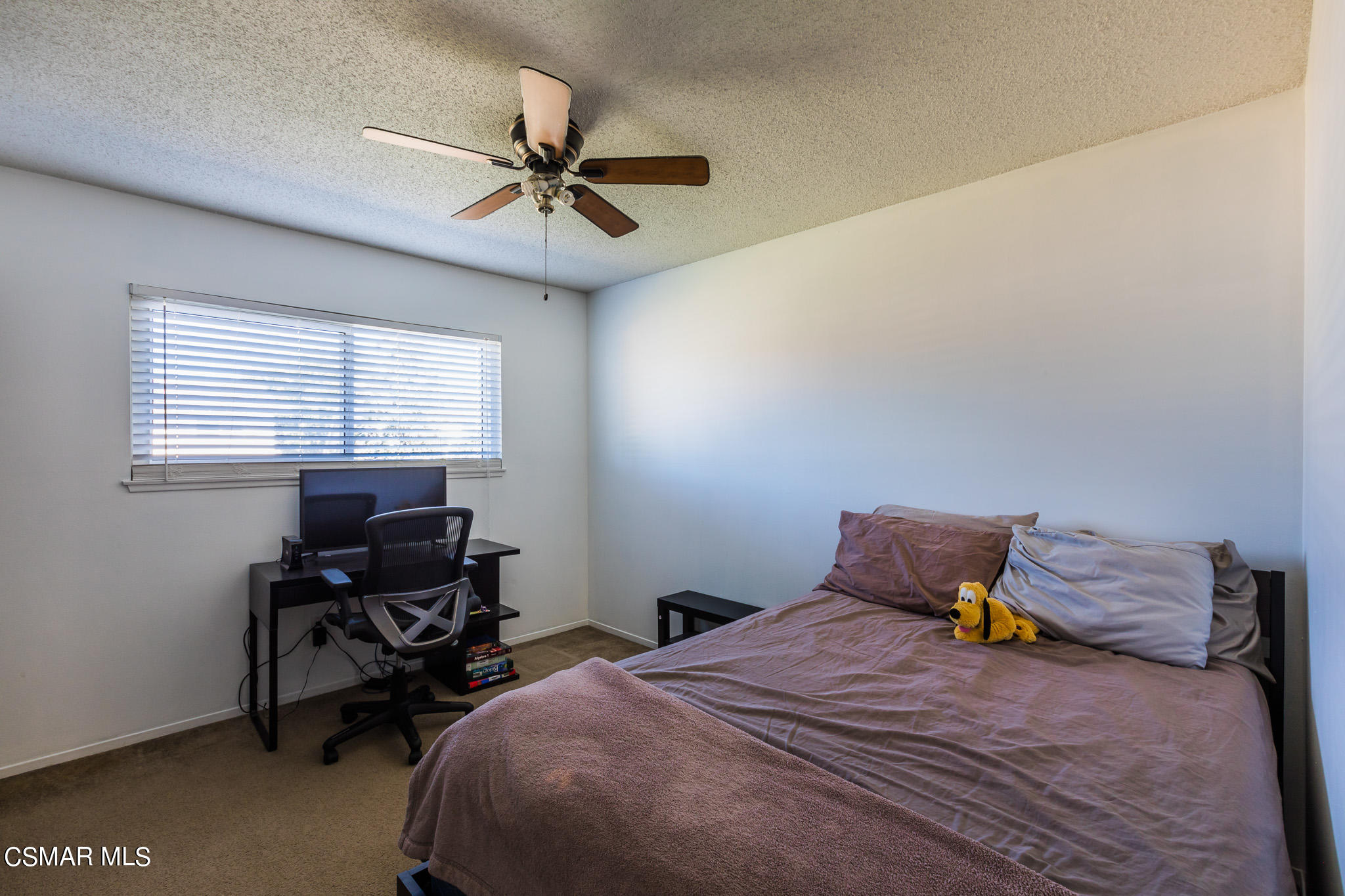 2149 Rhoda Street Simi Valley, CA 93065 - Photo 27 of 48 a bedroom with a bed and a window