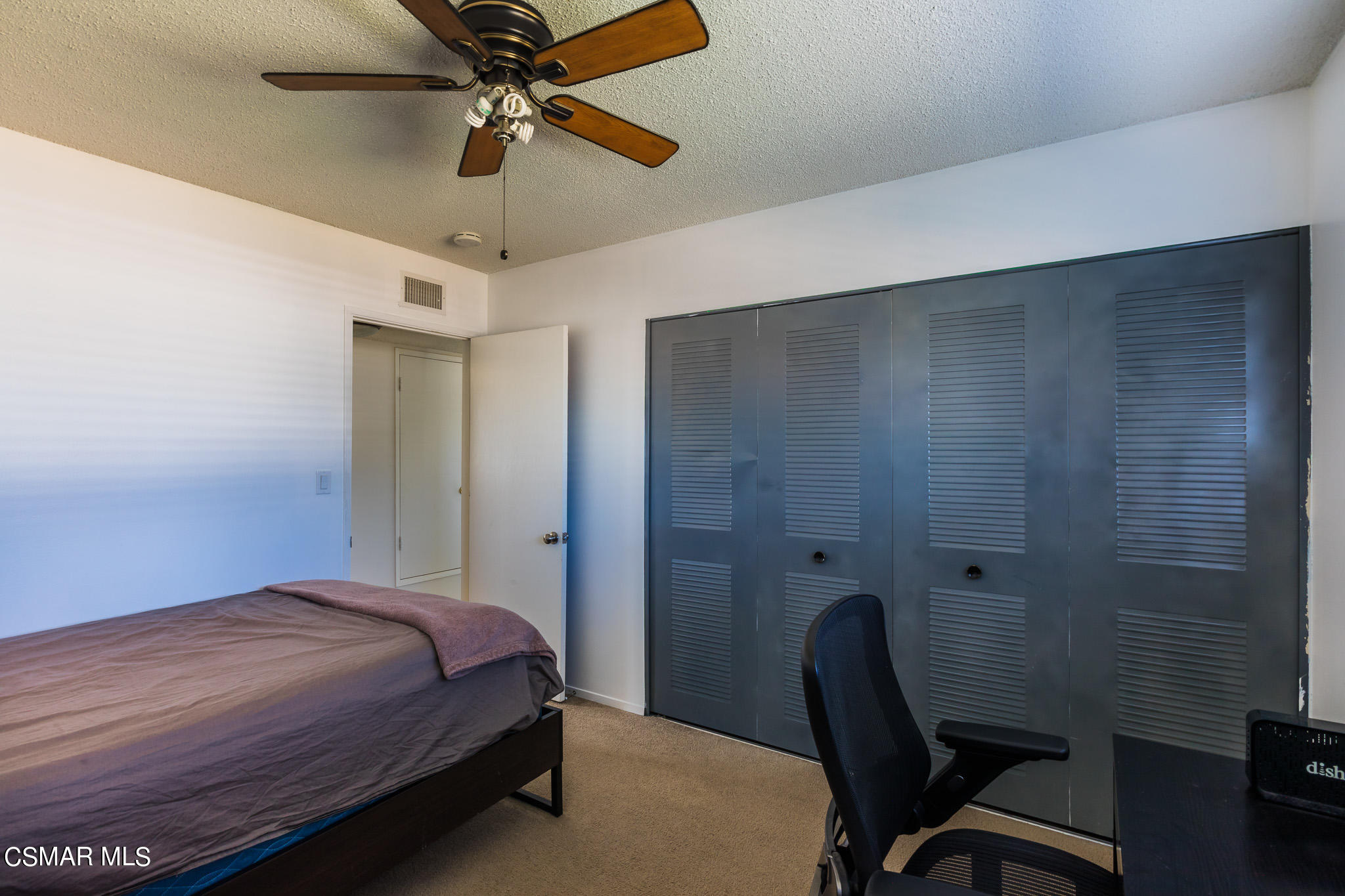 2149 Rhoda Street Simi Valley, CA 93065 - Photo 28 of 48 a bedroom with a bed and a chair