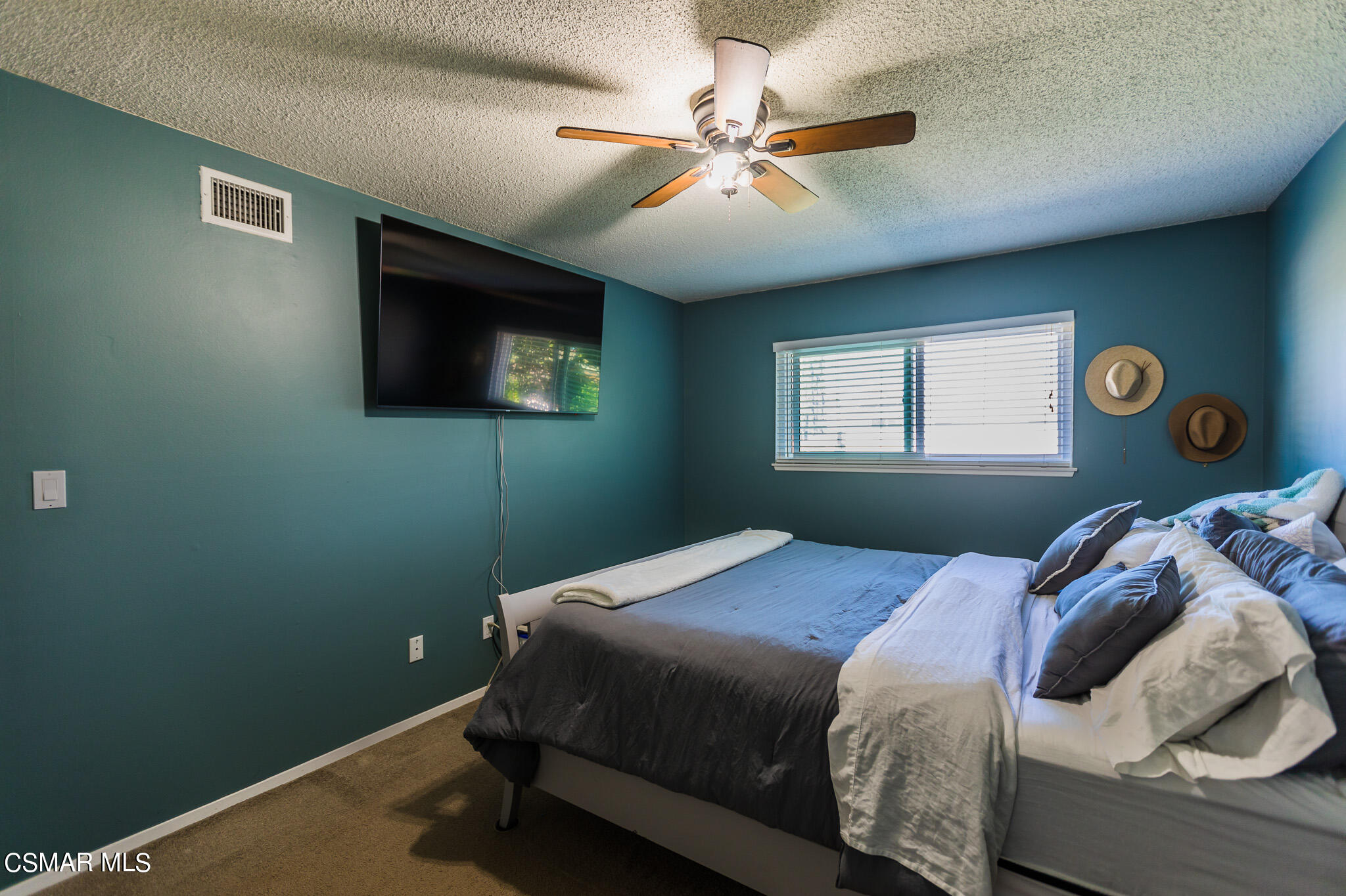 2149 Rhoda Street Simi Valley, CA 93065 - Photo 32 of 48 a bedroom with a bed and a window