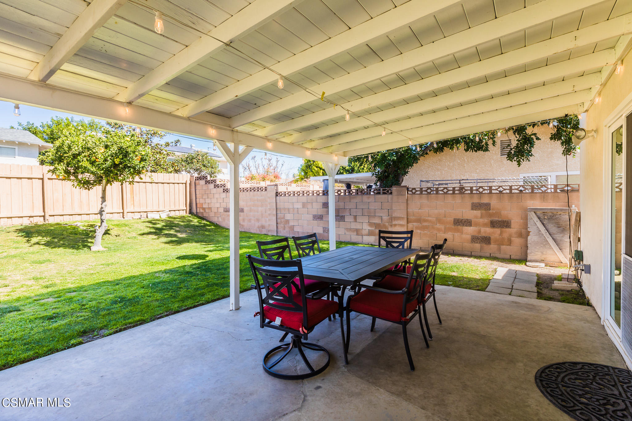 2149 Rhoda Street Simi Valley, CA 93065 - Photo 35 of 48 a view of a patio with a table and chairs