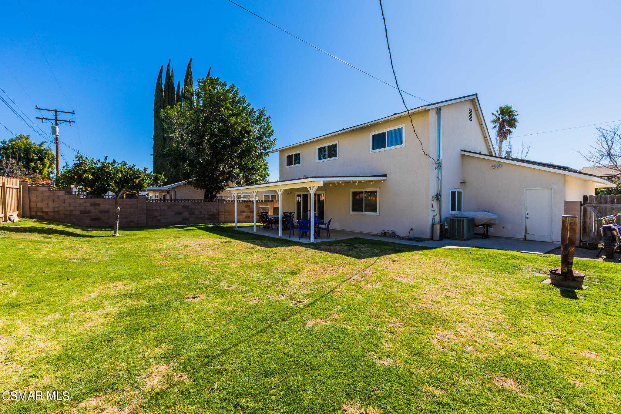 2149 Rhoda Street Simi Valley, CA 93065 - Photo 39 of 48 a backyard of a house with yard and outdoor seating