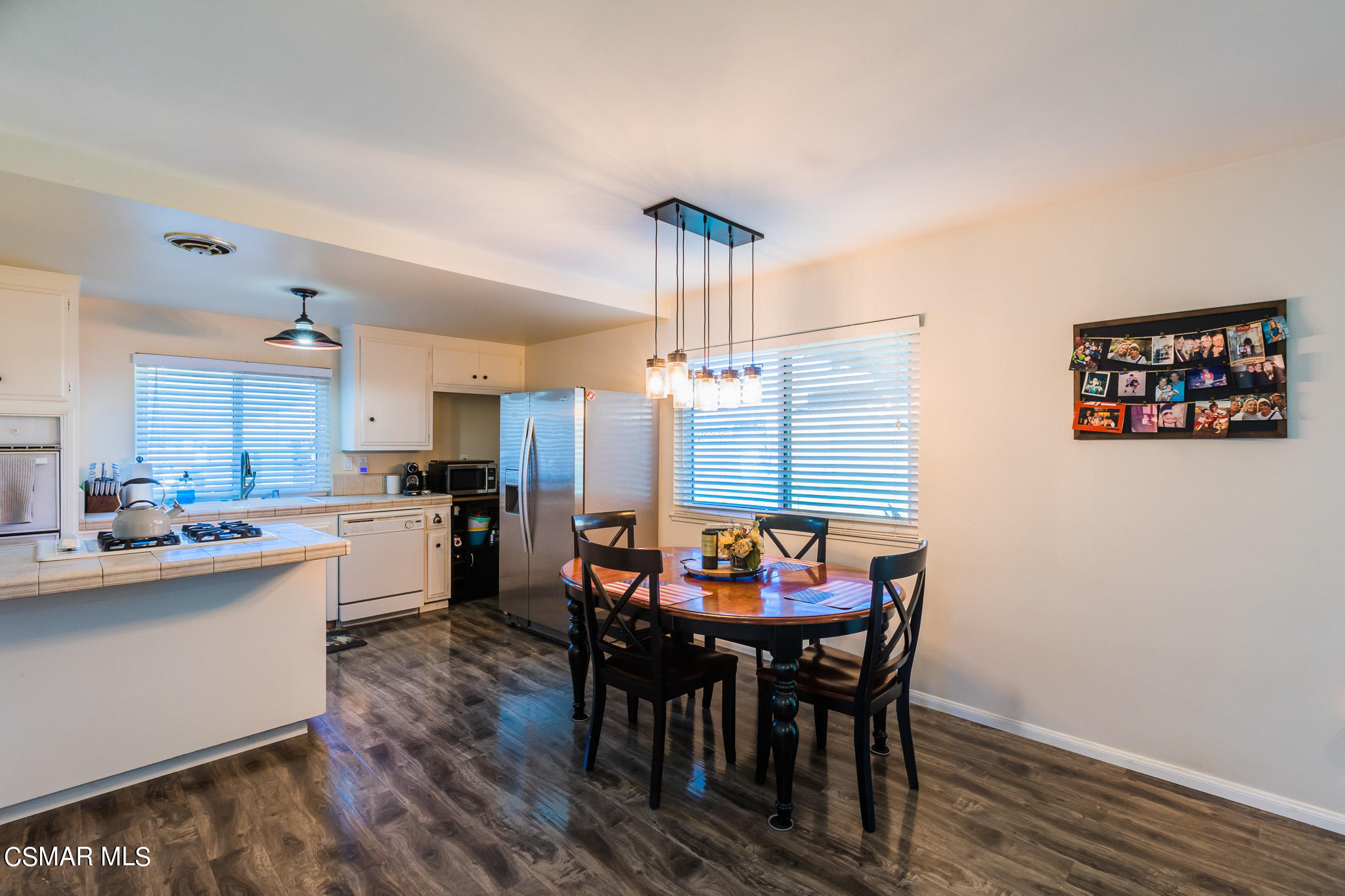 2149 Rhoda Street Simi Valley, CA 93065 - Photo 9 of 48 a view of a dining room with furniture and wooden floor