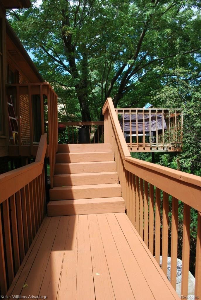 31241 Country Ridge Circle Farmington, MI 48331 - Photo 39 of 56 WALK WAY BETWEEN DECKS