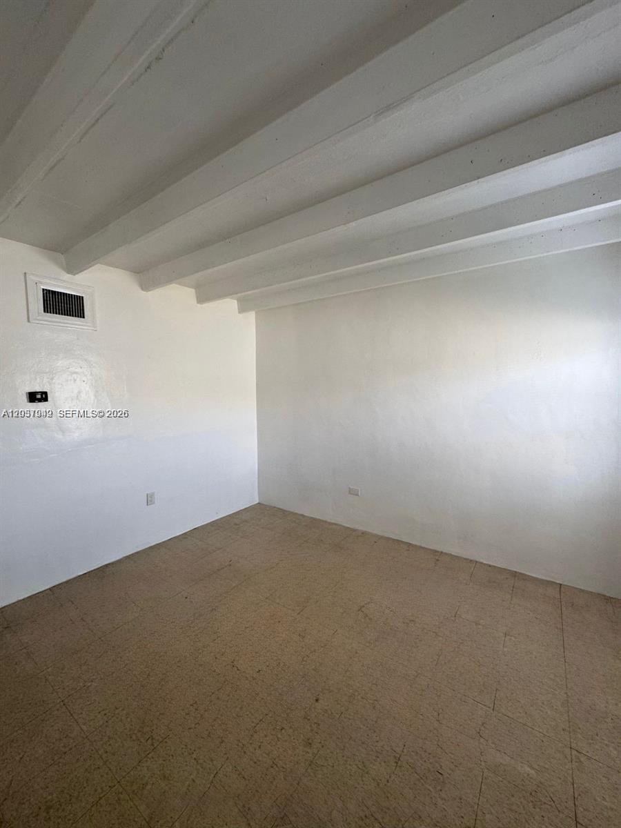 320 Southwest 11th Avenue, Unit 2 Homestead, FL 33030 - Photo 5 of 11 a view of an empty room