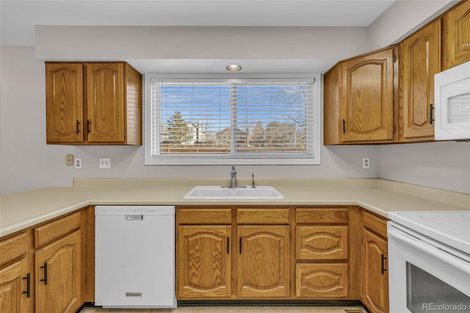 9390 Yale Lane Highlands Ranch, CO 80130 - Photo 20 of 50 a bathroom with a sink and a mirror
