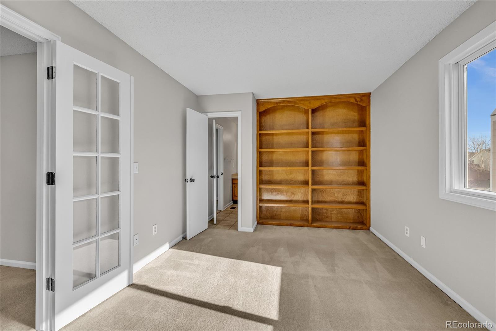 9390 Yale Lane Highlands Ranch, CO 80130 - Photo 33 of 50 a view of an empty room with a window