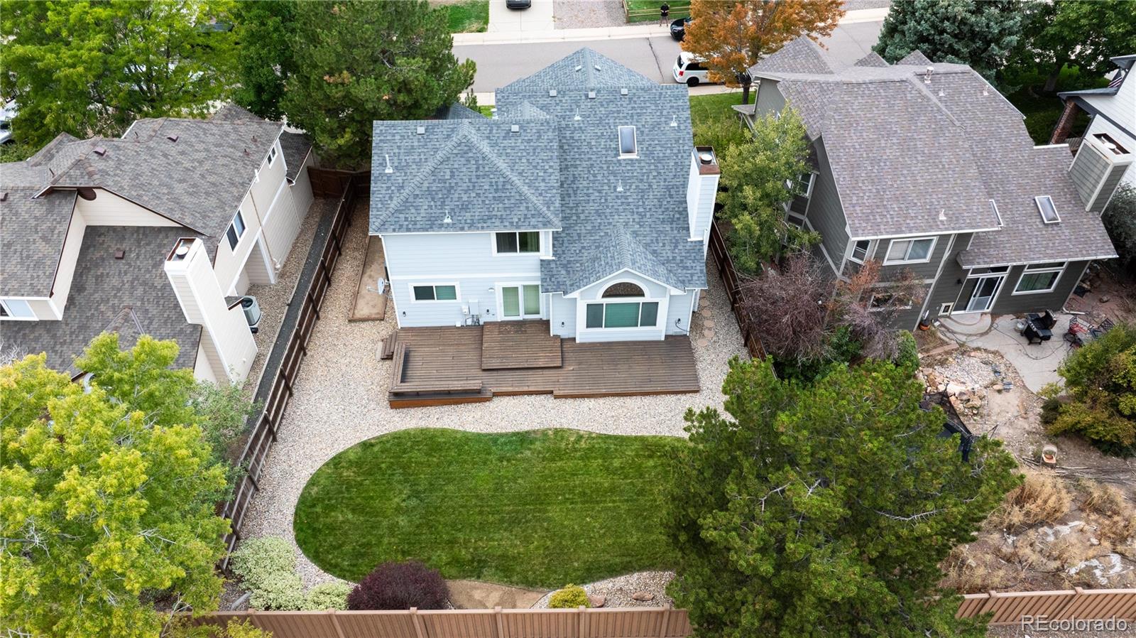 9390 Yale Lane Highlands Ranch, CO 80130 - Photo 45 of 50 an aerial view of a house with garden space and street view
