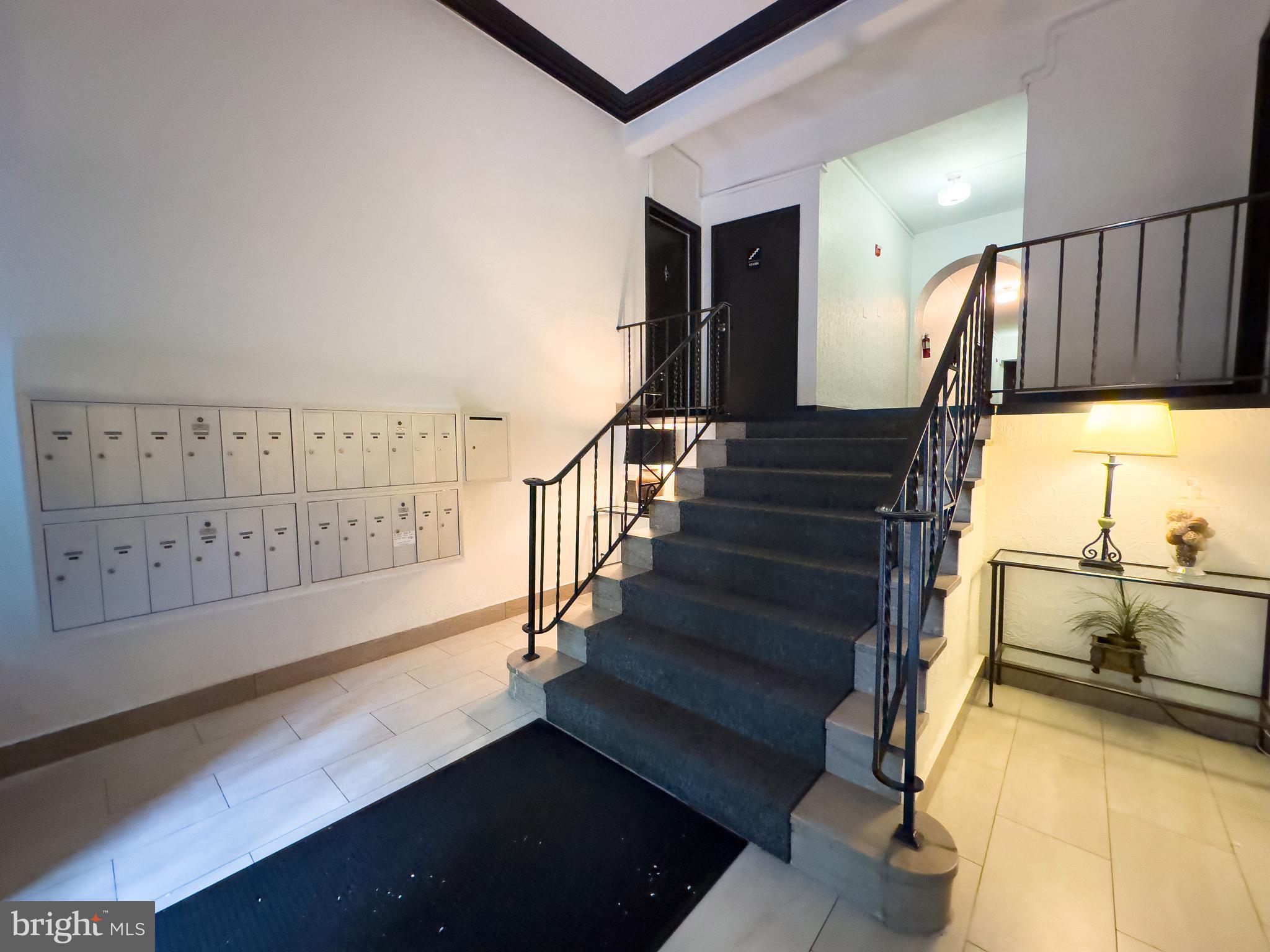 1441 Euclid Street Northwest, Unit 301 Washington, DC 20009 - Photo 18 of 18 a view of entryway and hall with wooden floor
