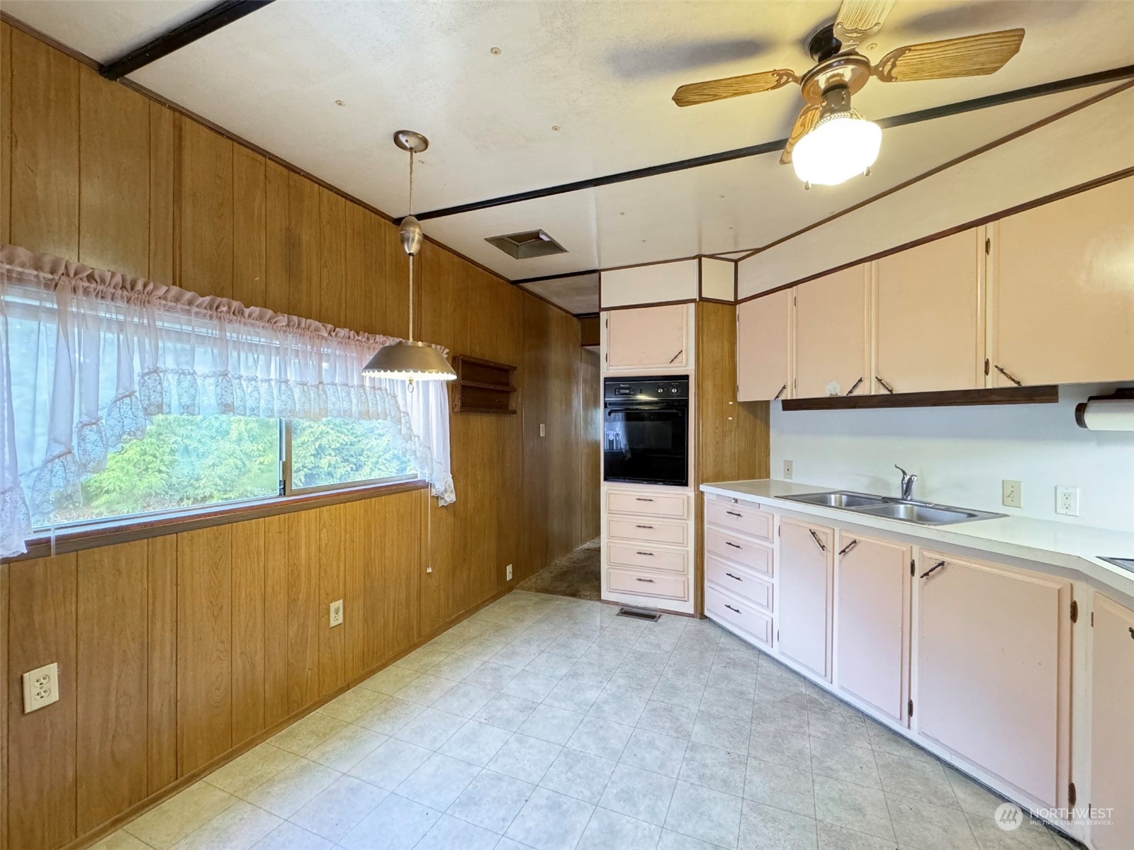 183 Spath Road Sequim, WA 98382 - Photo 14 of 40 a kitchen with stainless steel appliances granite countertop a sink and cabinets