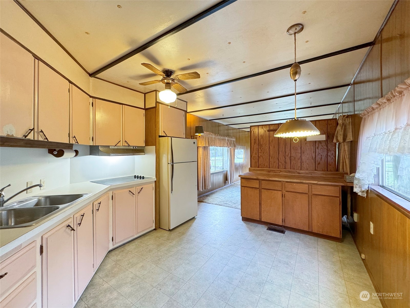 183 Spath Road Sequim, WA 98382 - Photo 17 of 40 a kitchen with stainless steel appliances granite countertop a sink and cabinets