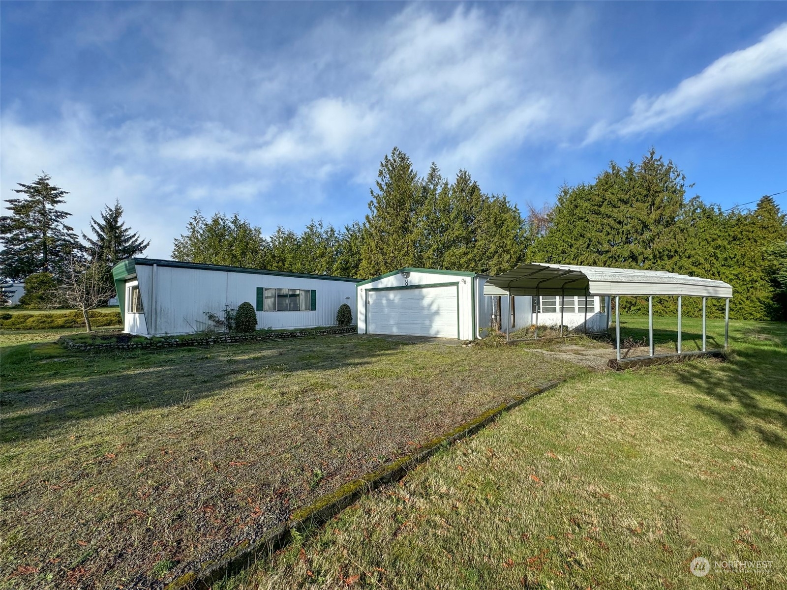183 Spath Road Sequim, WA 98382 - Photo 4 of 40 a view of a house with a yard