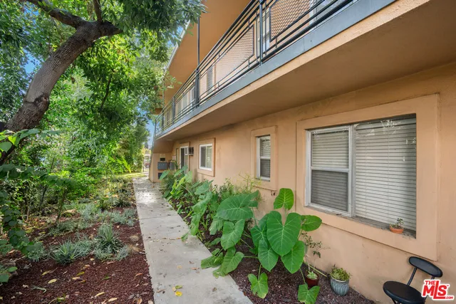 a view of balcony with furniture