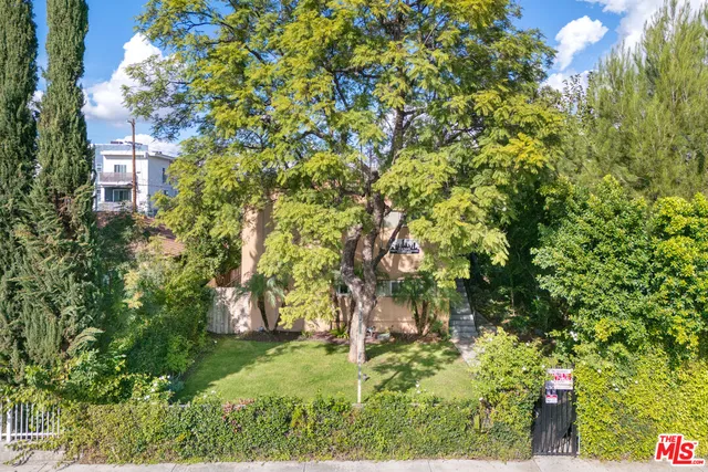 a view of a balcony with chairs